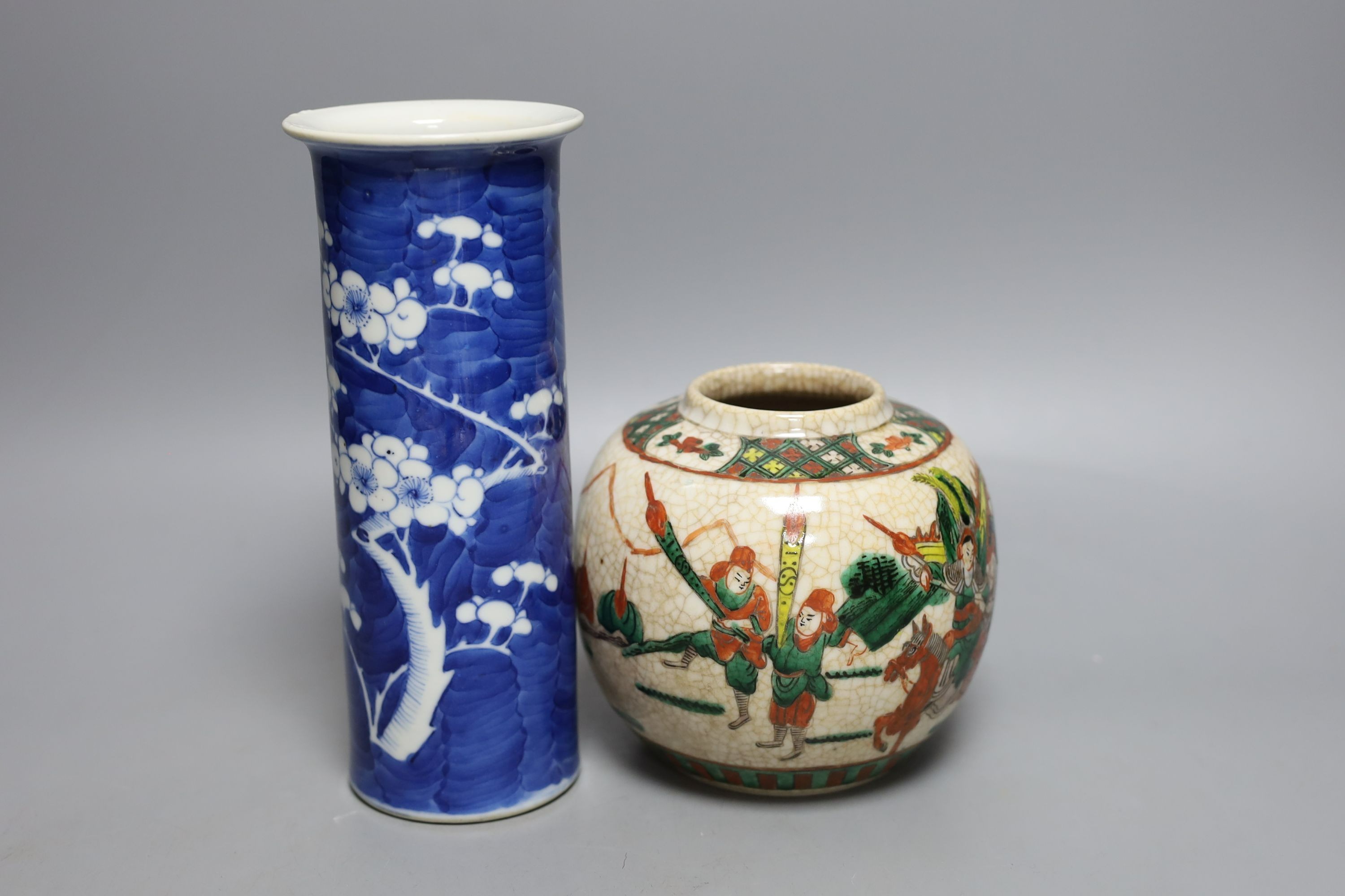 A Chinese blue and white sleeve vase, c.1900 and a crackle glaze jar. Tallest 20.5cm